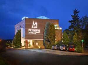 Night view of the illuminated Premium Hotel Znojmo building