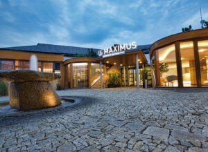 The main entrance of the Maximus resort in the evening with lighting